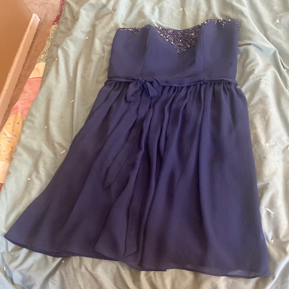 Women’s short strapless bridesmaid, homecoming or prom dress.